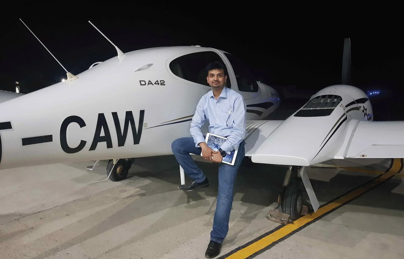 Nikhil Sharma with a DA42 aircraft