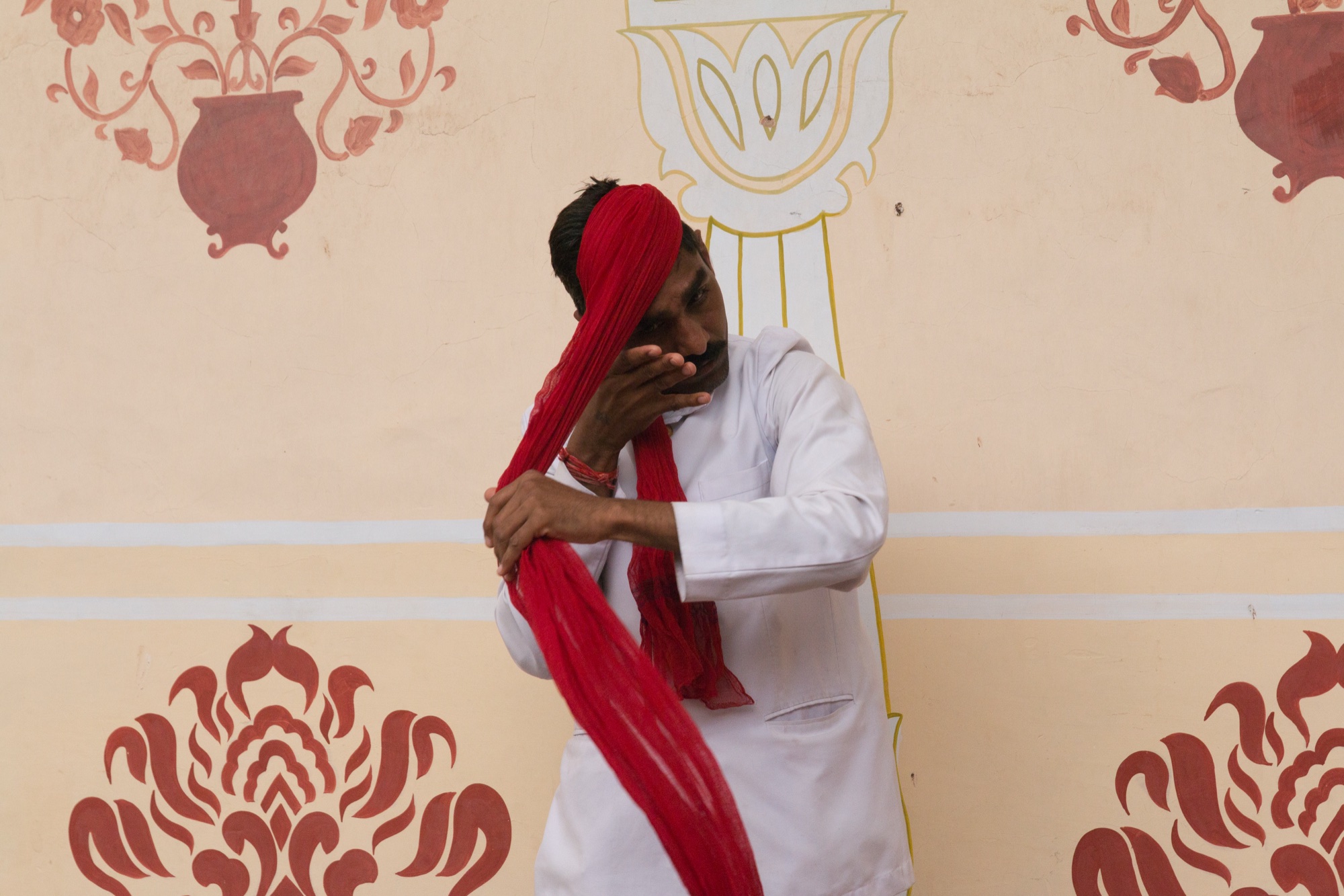 A turban being wound in the Pitam Niwas Chowk of the City Palace, Jaipur