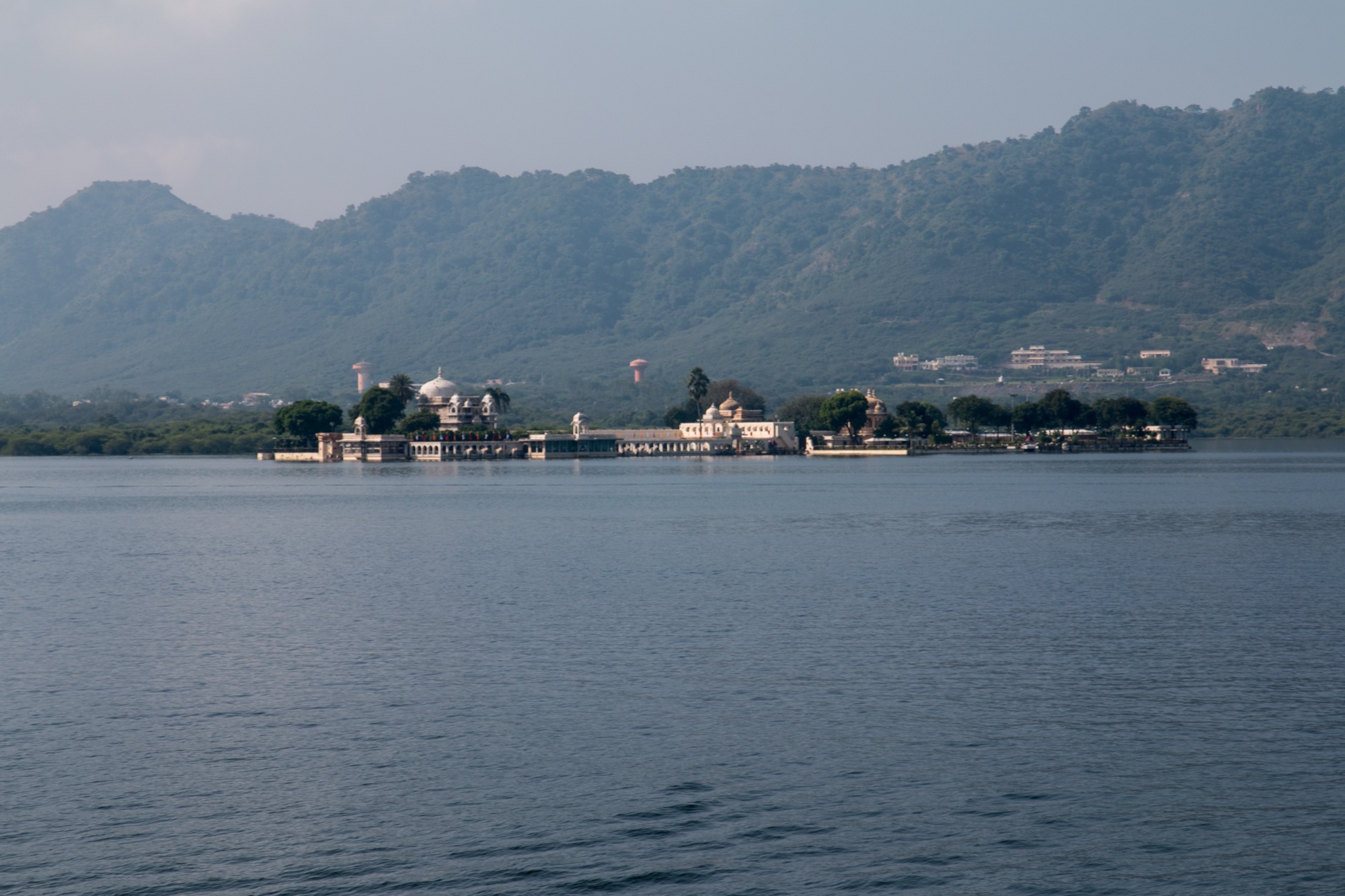 Jag Mandir on its island in Lake Pichola, the Aravallis behind