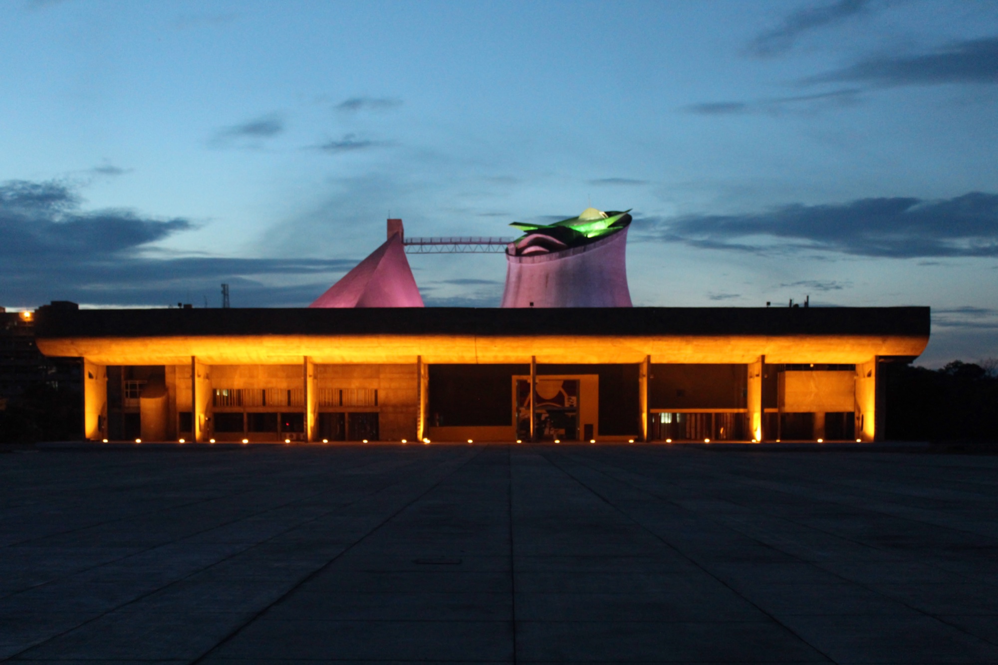 Le Corbusier's Assembly Building at Chandigarh's Capitol Complex, lit at dusk