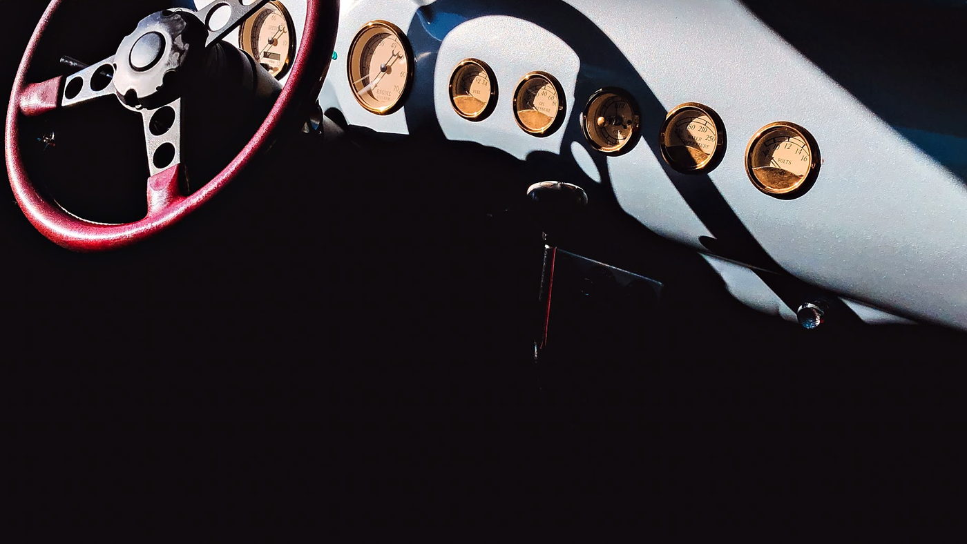 Vintage car dashboard — the Elevated India ground fleet