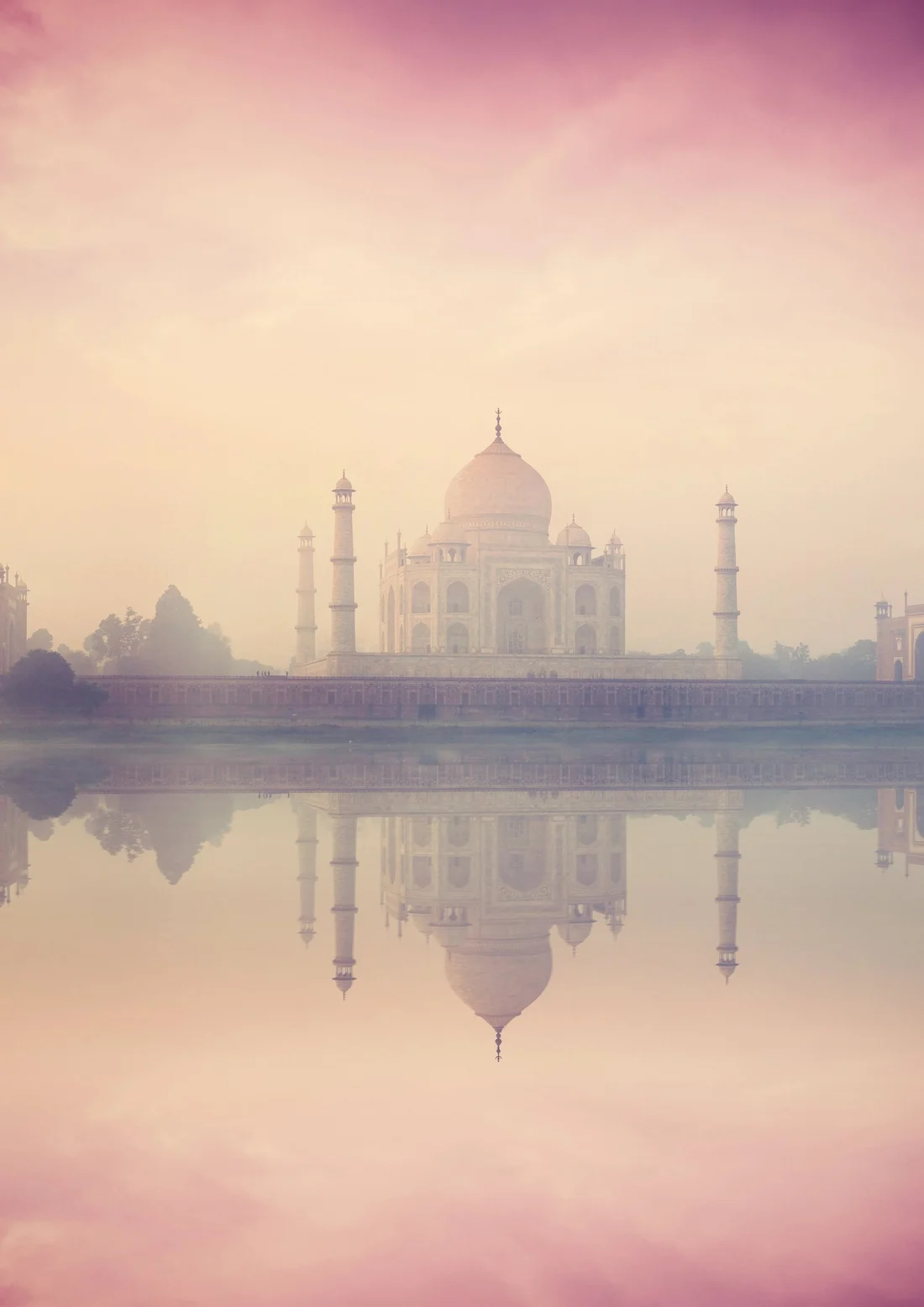 The Taj Mahal at dawn, seen across the Yamuna